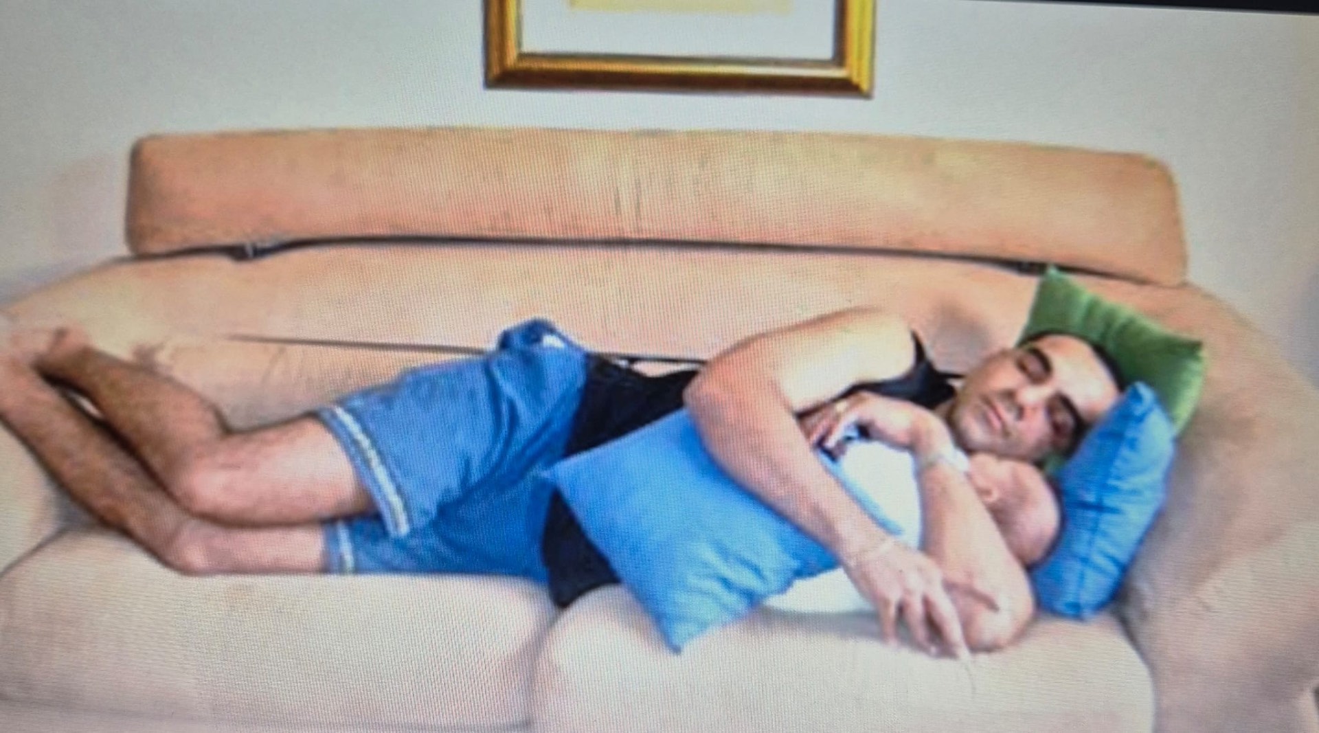 Afternoon nap protocol: baby on chest, world on pause.
